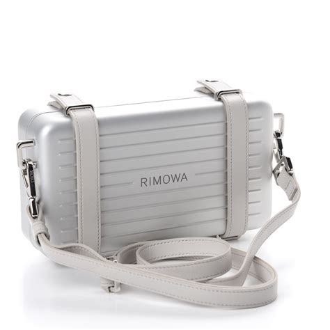 dior rimowa clutch men|christian Dior silver clutch.